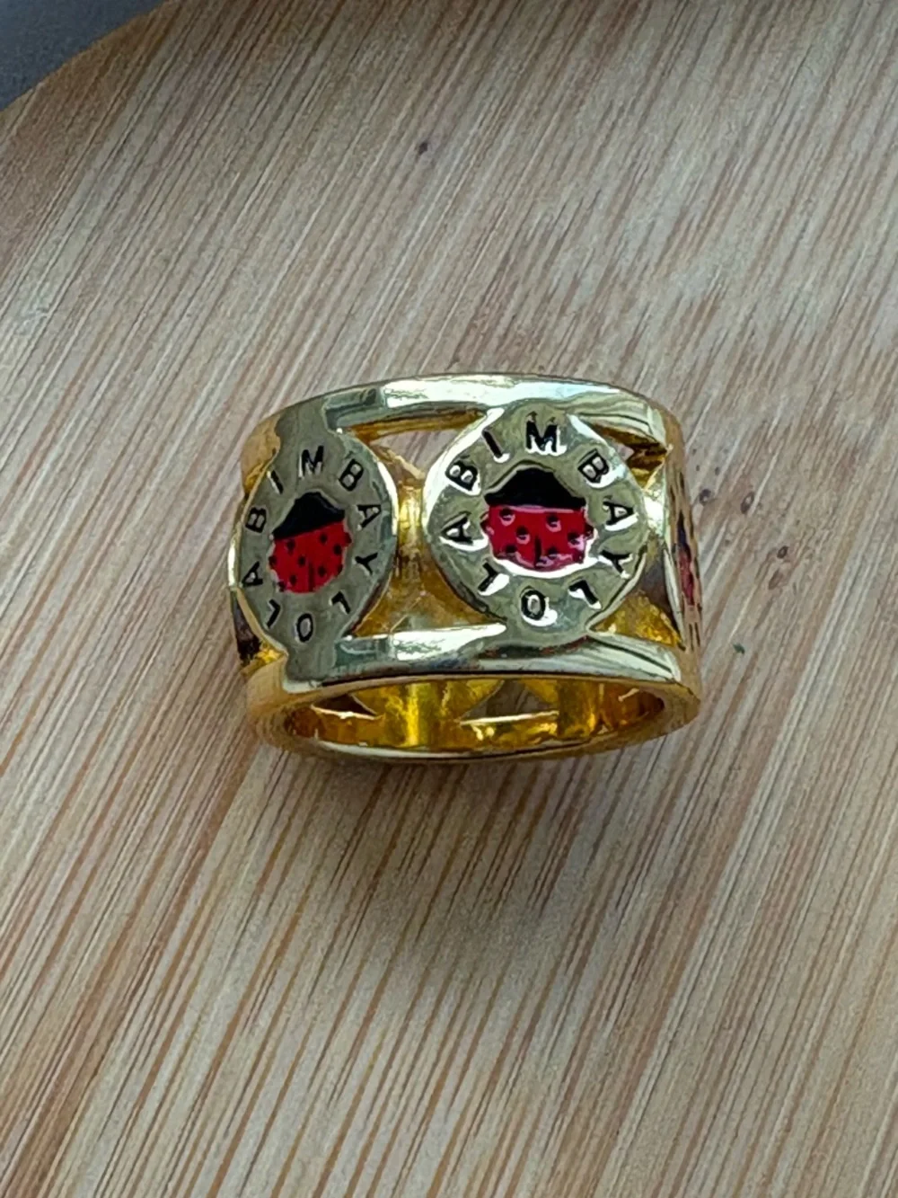 Bimba Y Lola Gold Tone Wide-Band Statement Ring with Red Ladybug Design Size 6.5 - Picture 1 of 9